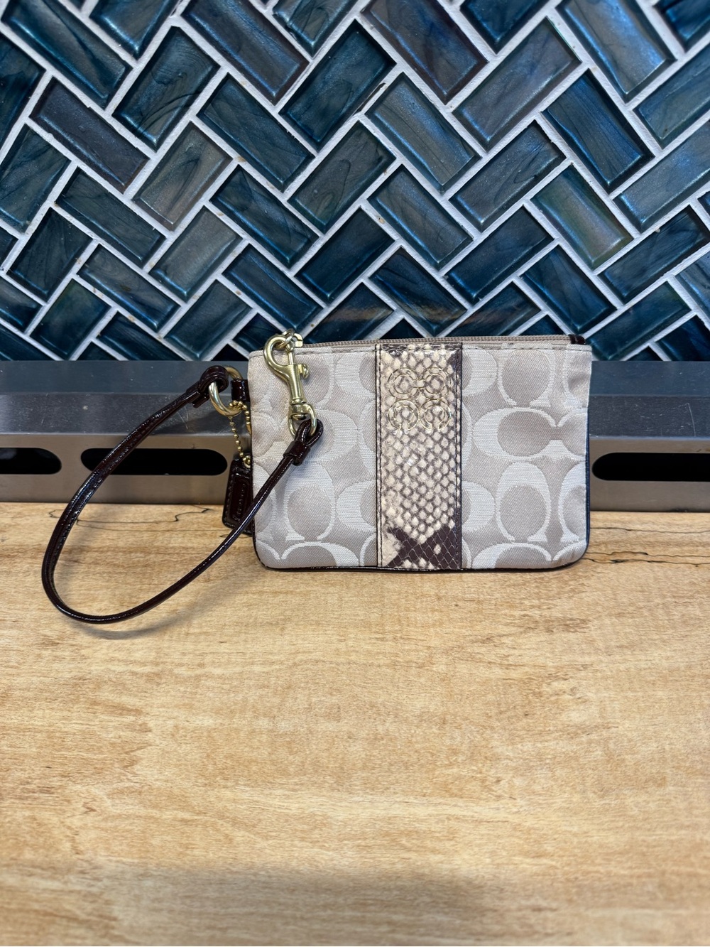 Coach Neutral Signature Wristlet with Snakeskin Stripe